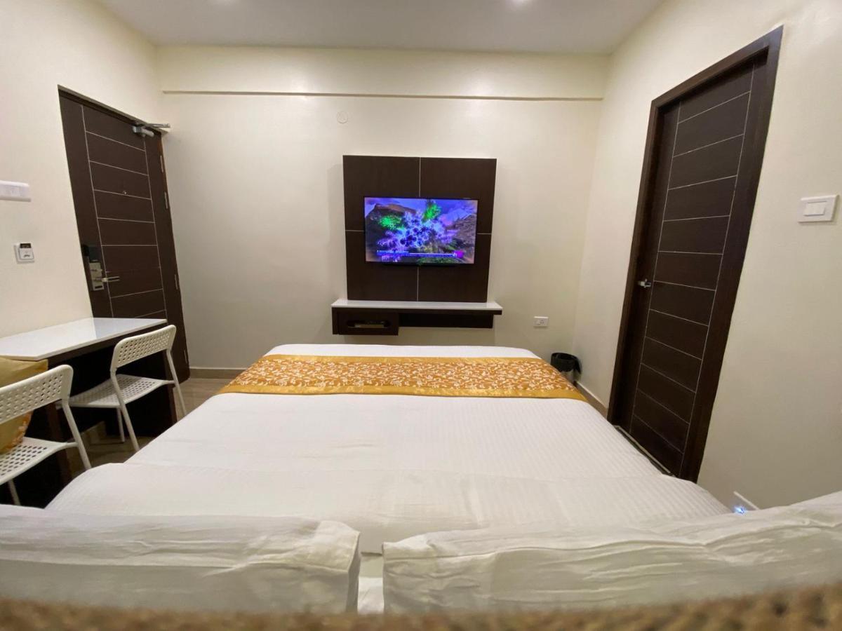 Le Shiv Executive Suite Theni Extérieur photo